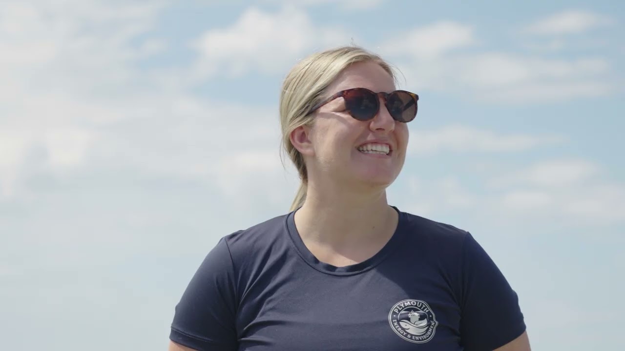 A Town of Plymouth staff member speaking on the shoreline in the case study video